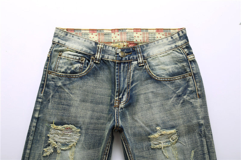 Men's shredded nostalgic jeans flag bottom cloth more worn and washed denim trousers